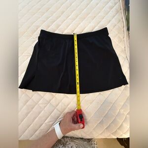 Swimsuits for all / Black swim skirt with side slits.